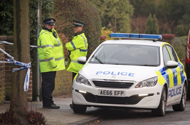 Police at the scene (Peter Byrne/PA)