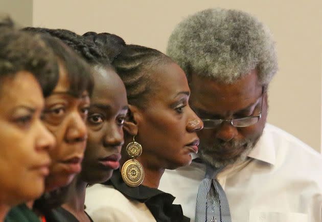 Robert Champion's mother (second from right) and father listen during a trial over their son's death in October 2014. (Photo: Red Huber/Orlando Sentinel/Tribune News Service via Getty Images)