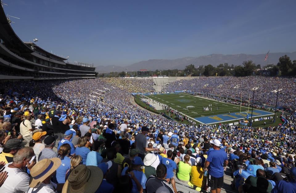 FILE - UCLA plays Oregon during a Pac-12 NCAA college football game at the Rose Bowl in Pasadena, Calif., Oct. 11, 2014. There are 23 venues bidding to host soccer matches at the 2026 World Cup in the United States, Mexico and Canada. (AP Photo/Doug Benc, File)