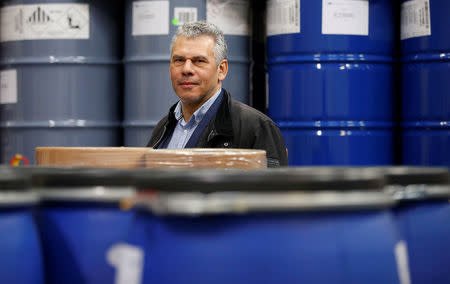 Julian Sarkar, director of Zanos ltd, poses for a picture at his warehouse in Liverpool, Britain February 22, 2018. Picture taken February 22, 2018. REUTERS/Andrew Yates