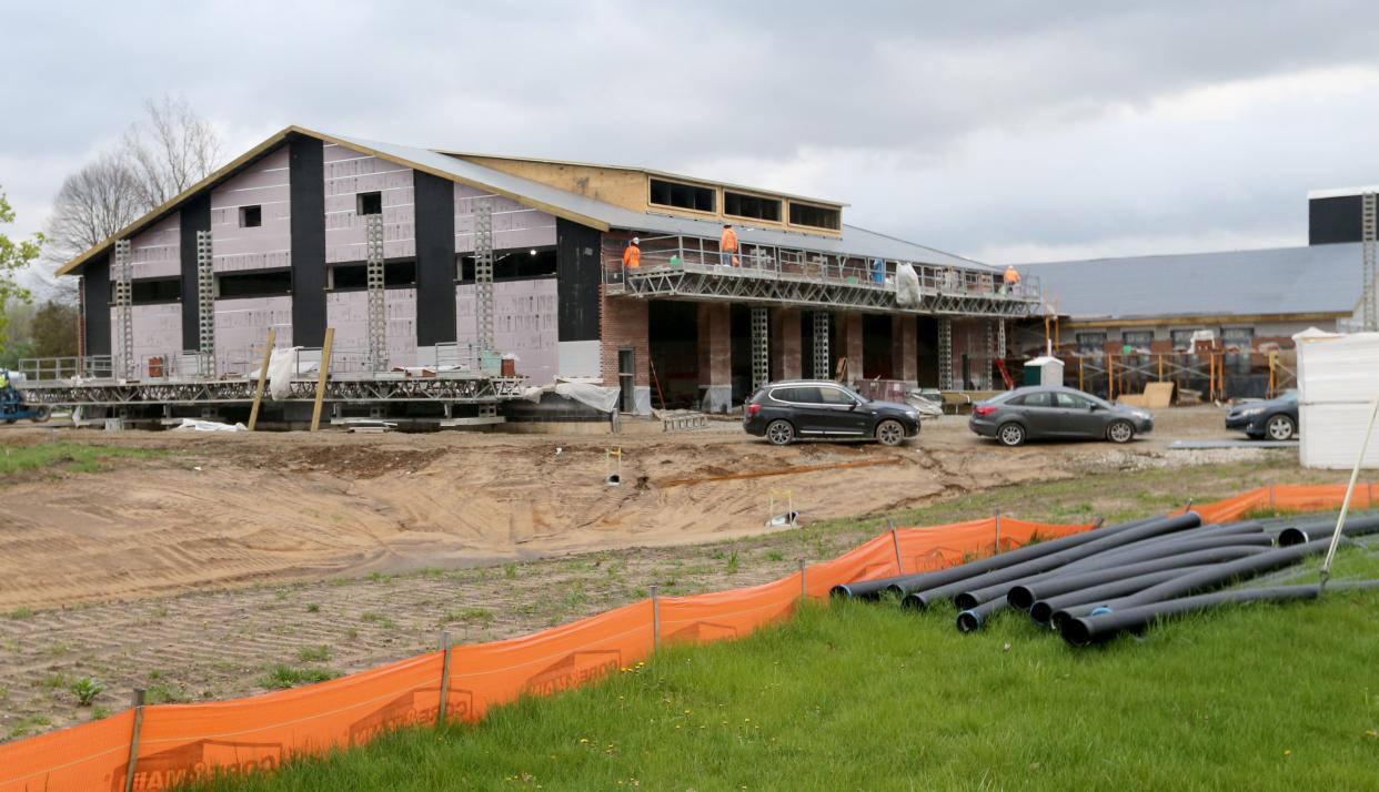 Construction crews work Wednesday, April 17, 2024, at the new Mishawaka Fire Station No. 2 site on McKinley Avenue in front of Liberty Elementary School. Officials say construction is on schedule for the building to be done sometime in September.