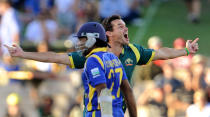 Australian paceman Clint McKay celebrates dismissing Sri Lankan batsman Mahela Jayawardene in the final of the CB Series in Adelaide on March 8, 2012.