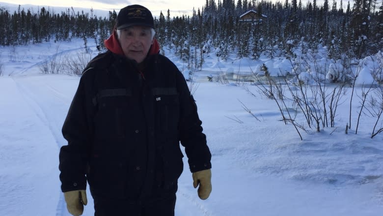 Tsiigehtchic, N.W.T., elder wants government to solve drainage problem near cabin