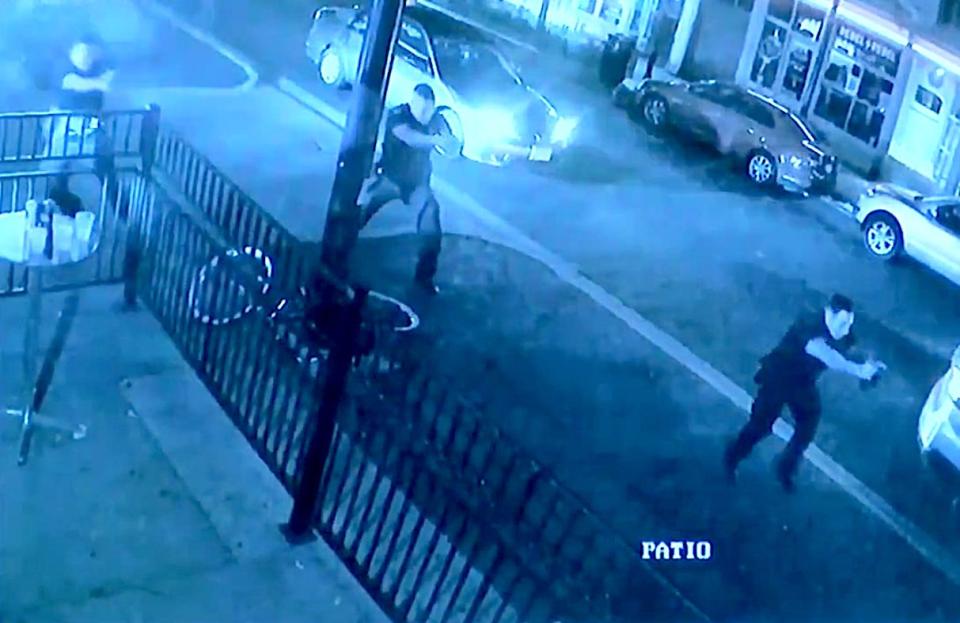 Surveillance footage near Ned Peppers shows police officers responding to the gunman within seconds of his first shot. (Photo: Dayton Police Department)