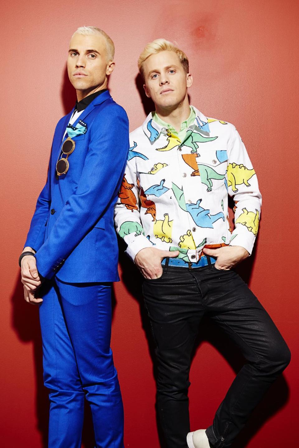 Tyler Glenn, left, and Chris Allen, of the band Neon Trees, pose for a portrait to promote the band's upcoming third album, "Pop Pyschology," on Tuesday, April 22, 2014 in New York. (Photo by Dan Hallman/Invision/AP)