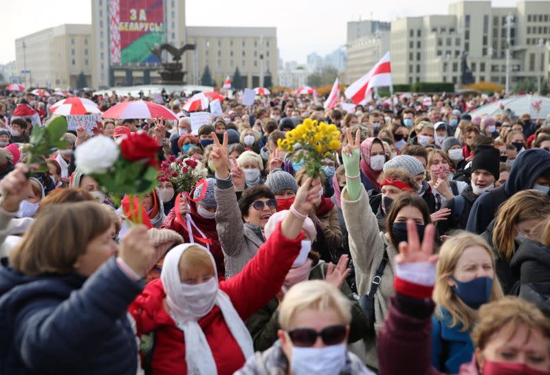 Belarusian opposition supporters hold a rally in Minsk