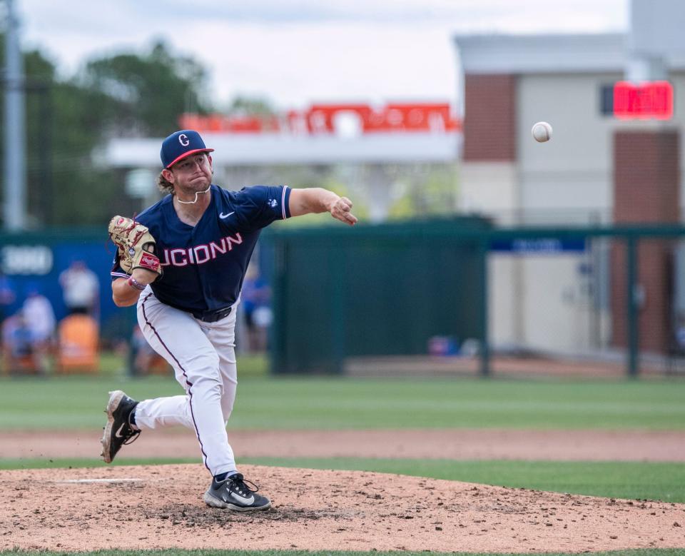 UConn's Zach Fogell pitches in relief against Florida in the NCAA Regionals in June.