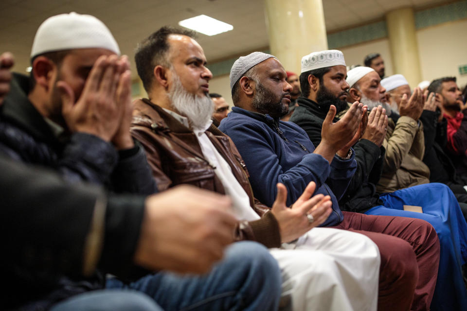 Muslims attend a vigil at the East London Mosque for the victims of the New Zealand mosque attacks.