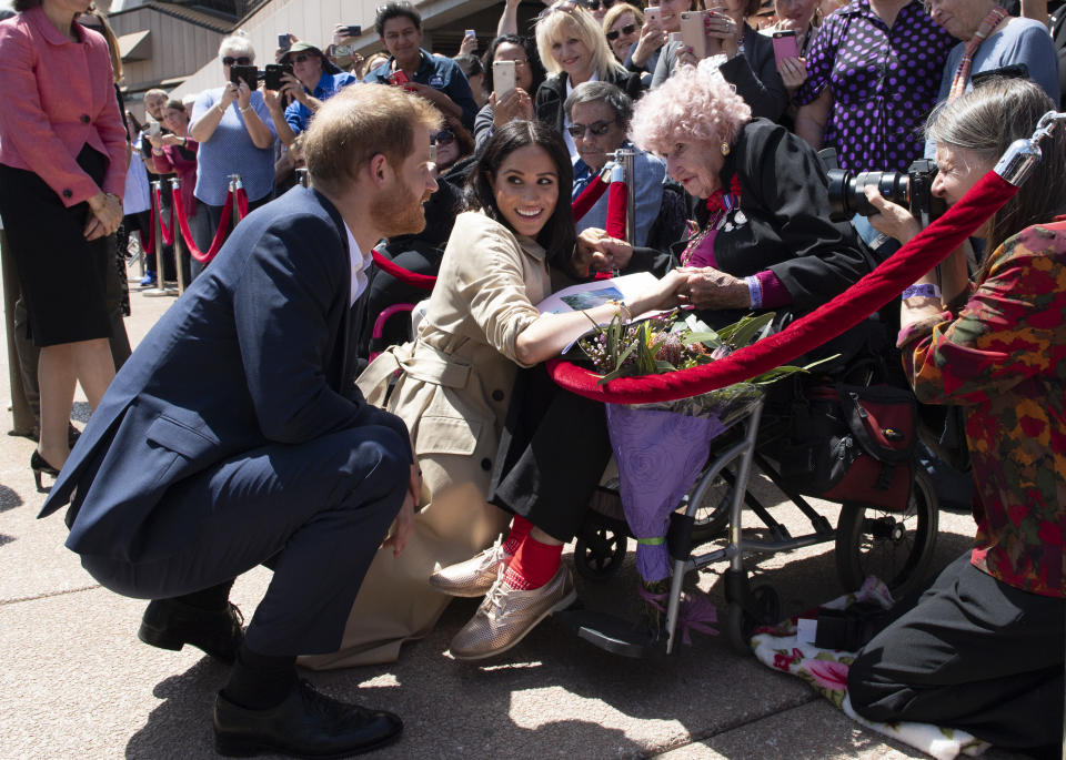 The Duke and Duchess of Sussex chat with&nbsp;Daphne Dunne.&nbsp; (Photo: Pool via Getty Images)