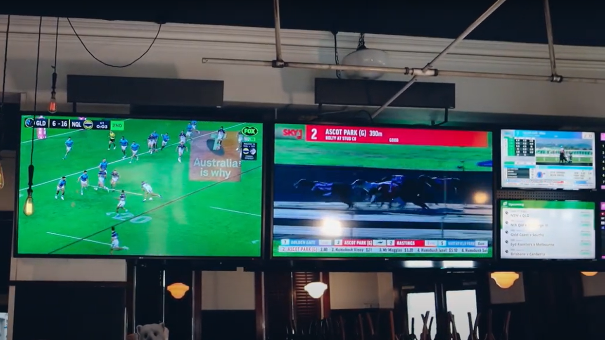  TV screens at a bar powered by Kramer AV solutions. . 