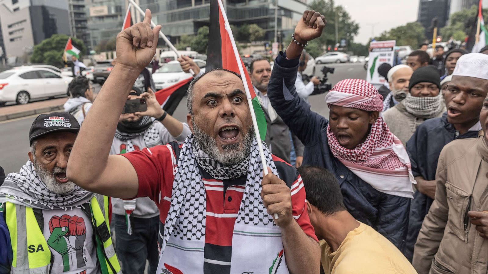 PHOTO: Protesters shout slogans and wave flags during a pro Palestinian demonstration near the US consulate in Sandton, Johannesburg, on October 11, 2023. (Afp Contributor#afp/AFP via Getty Images)