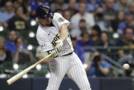 Milwaukee Brewers' Willy Adames hits a two-run home run during the third inning of a baseball game against the New York Mets, Friday, Sept. 24, 2021, in Milwaukee. (AP Photo/Aaron Gash)