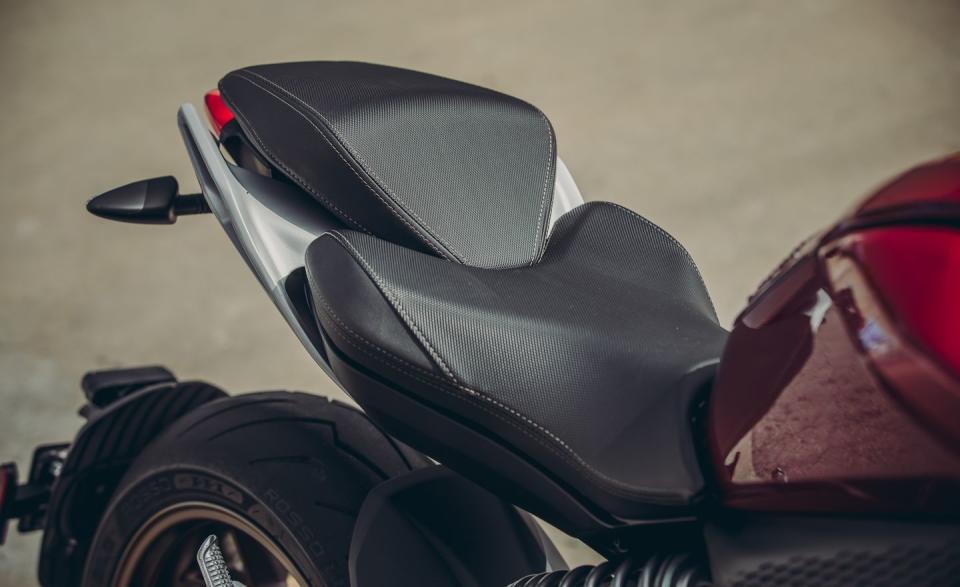 <p>In place of a gas motorcycle's fuel tank, the Zero SR/F offers a small storage bin with two USB charging ports.</p>