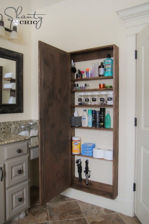 bathroom storage ideas, wooden shelving unit in the bathroom