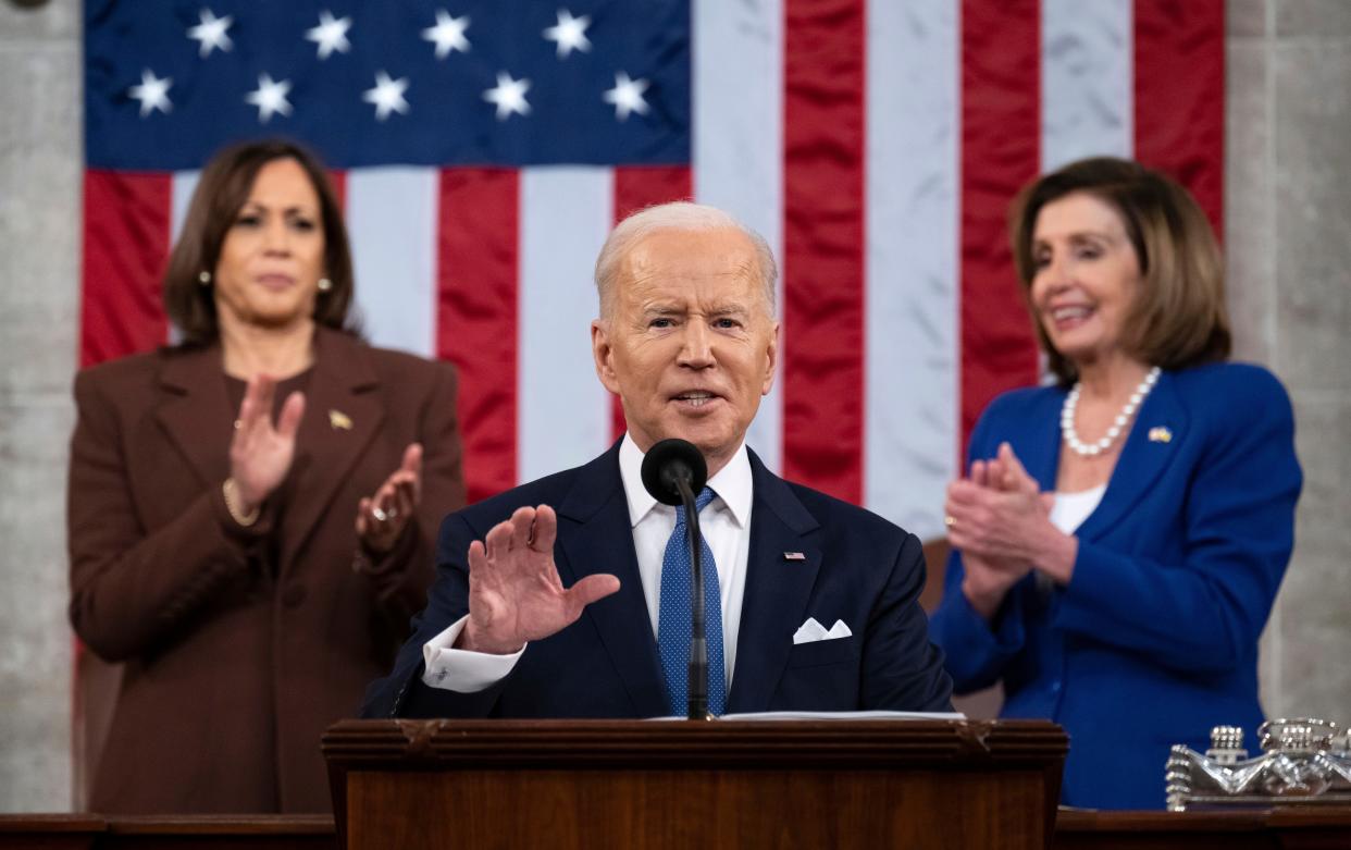 President Joe Biden delivers his first State of the Union address to a joint session of Congress at the Capitol, as Vice President Kamala Harris and House Speaker Nancy Pelosi of California watch, Tuesday, March 1, 2022, in Washington.