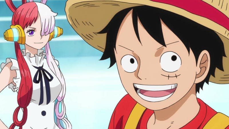 Uta and Luffy stand on stage.