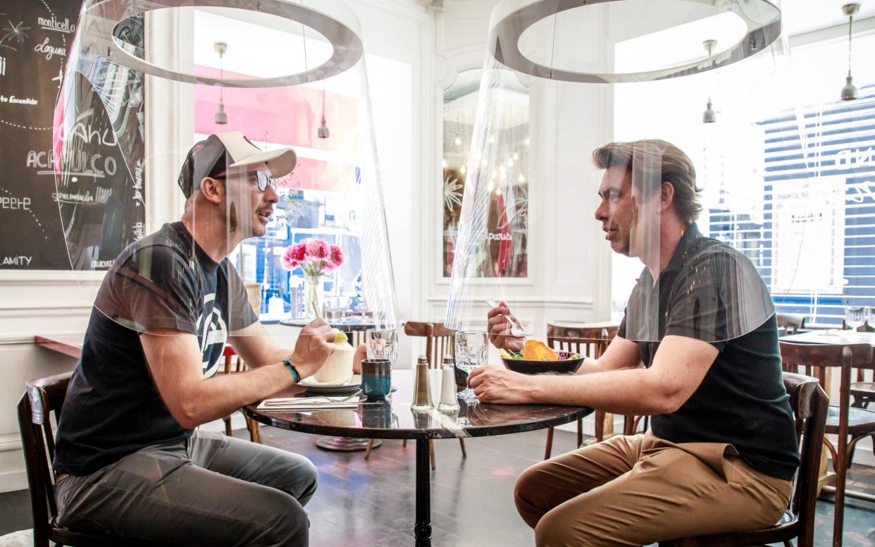 Protection bubbles for customers of restaurants in Paris - CHRISTOPHE PETIT TESSON/EPA-EFE/Shutterstock