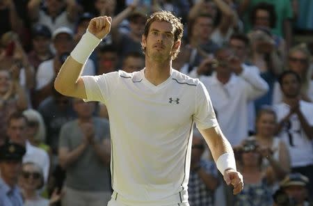 Andy Murray of Britain celebrates after winning his match against Mikhail Kukushkin of Kazakhstan at the Wimbledon Tennis Championships in London, June 30, 2015. REUTERS/Henry Browne