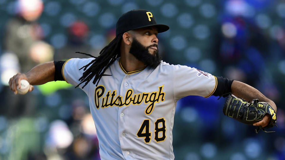 FILE - Pittsburgh Pirates closer Richard Rodríguez delivers a pitch during the ninth inning of a baseball game against the Chicago Cubs, April 1, 2021, on opening day at Wrigley Field in Chicago. Outfielder/first baseman Danny Santana, pitcher Richard Rodríguez and infielder José Rondón were suspended for 80 games each, Monday, April 4, 2022, in the first discipline since the major league drug testing program resumed March 11 following a 99-day suspension during the lockout. (AP Photo/Paul Beaty, File)