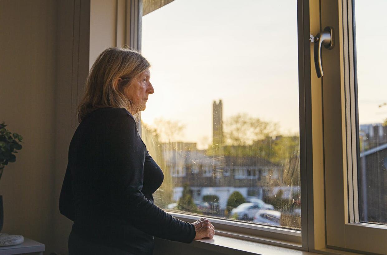 <span class="caption">In healthy older people, loneliness has a pattern of stress response similar to that of people who are under chronic stress. </span> <span class="attribution"><a class="link " href="https://www.gettyimages.com/detail/photo/senior-woman-looking-out-of-her-bedroom-window-at-royalty-free-image/1218053691" rel="nofollow noopener" target="_blank" data-ylk="slk:Justin Paget via Getty Images;elm:context_link;itc:0;sec:content-canvas">Justin Paget via Getty Images</a></span>