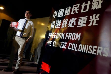 FILE PHOTO - Hong Kong National Party convenor Andy Chan attends a rally at a university, on the eve of the 20th anniversary of the territory's handover to Chinese rule, in Hong Kong, China June 30, 2017.      REUTERS/Bobby Yip/File Photo