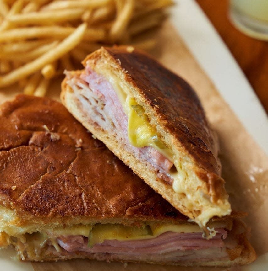 A toasty Cuban sandwich is served at Padrino's restaurant in Boca Raton.