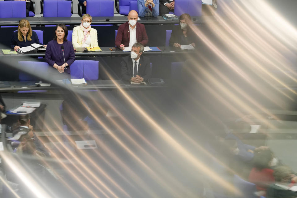 German Foreign Minister Annalena Baerbock, second from left, answeres to questions of lawmakers about the German government Ukrainian policy during a session of the German parliament Bundestag in Berlin, Germany, Wednesday, April 27, 2022. (AP Photo/Markus Schreiber)
