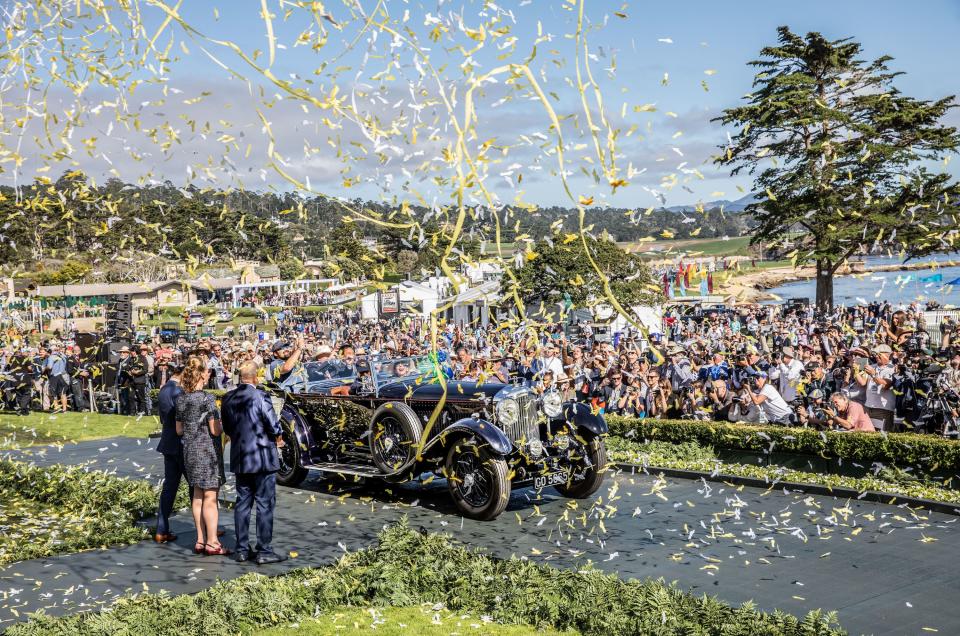 Confetti is shot over the 1931 Bentley 8-Litre Sports Tourer, the newly minted winner of the 2019 Best of Show award at the Pebble Beach Concours d’Elegance.