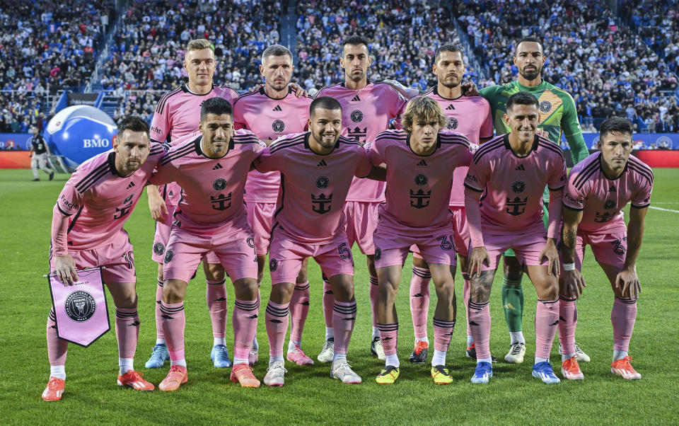 Inter Miami players pose for a team photo prior to an MLS soccer game against CF Montreal in Montreal, Saturday, May 11, 2024. (Graham Hughes/The Canadian Press via AP)