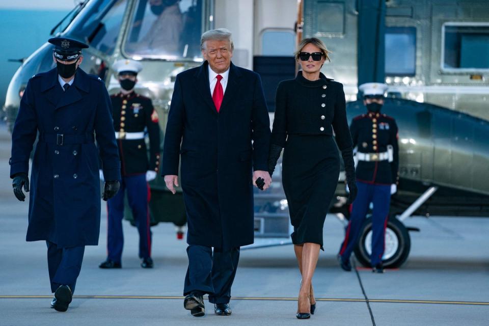 Melania and Trump leaving the White House in January 2021 (AFP via Getty Images)