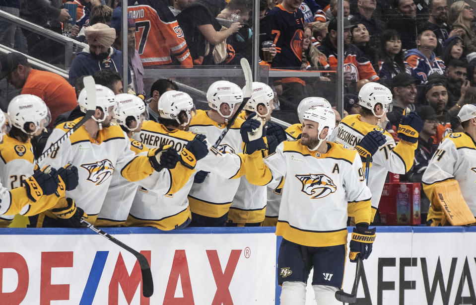 Nashville Predators' Ryan O'Reilly (90) celebrates a goal against the Edmonton Oilers during the second period of an NHL hockey game in Edmonton on Saturday Nov. 4, 2023. (Jason Franson/The Canadian Press via AP)