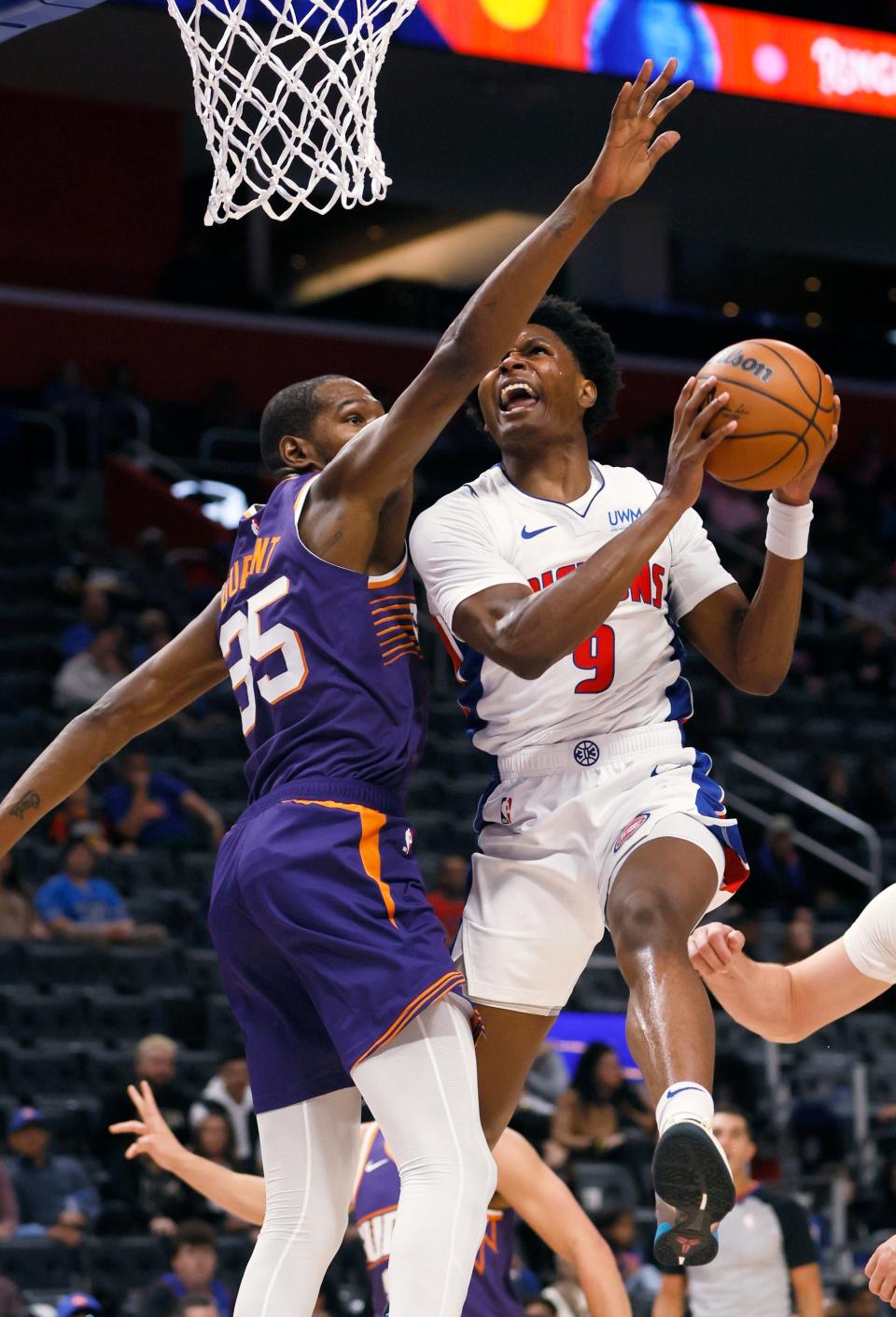 Pistons forward Ausar Thompson goes to the basket against Suns forward Kevin Durant during the first half of a preseason game on Sunday, Oct. 8, 2023, at Little Caesars Arena.