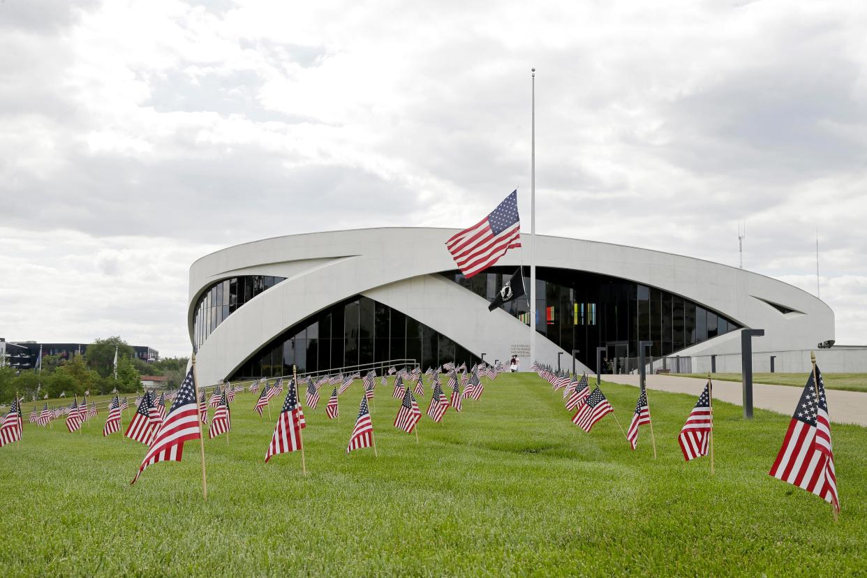 Flags decorate the lawn outside the National Veterans Memorial and Museum in Columbus in preparation for the Memorial Day remembrance ceremony in this 2021 file photo.