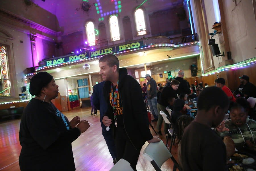 Katherine Campbell (l to r) talks with Justin Stoddard John Muir Elementary School whose class attended the Black Panther Party’s Free Breakfast for Children Program 50th year anniversary event Campbell organized at the Church of Eight Wheels on Thursday, November 14, 2019 in San Francisco, Calif. Campbell started volunteering at the Back Panther Party’s Free Breakfast for Children Program in 1969 which has inspired her in her work as a community specialist. (Photo By Lea Suzuki/The San Francisco Chronicle via Getty Images)