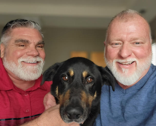 Gay dog abandoned at North Carolina shelter adopted by same sex  