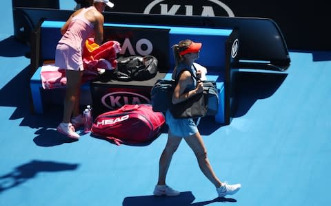 Maria Sharapova of Russia walks off after losing her fourth round match against Ashleigh Barty of Australia during day seven of the 2019 Australian Open at Melbourne Park on January 20, 2019 in Melbourne, Australia - Credit: Getty Images