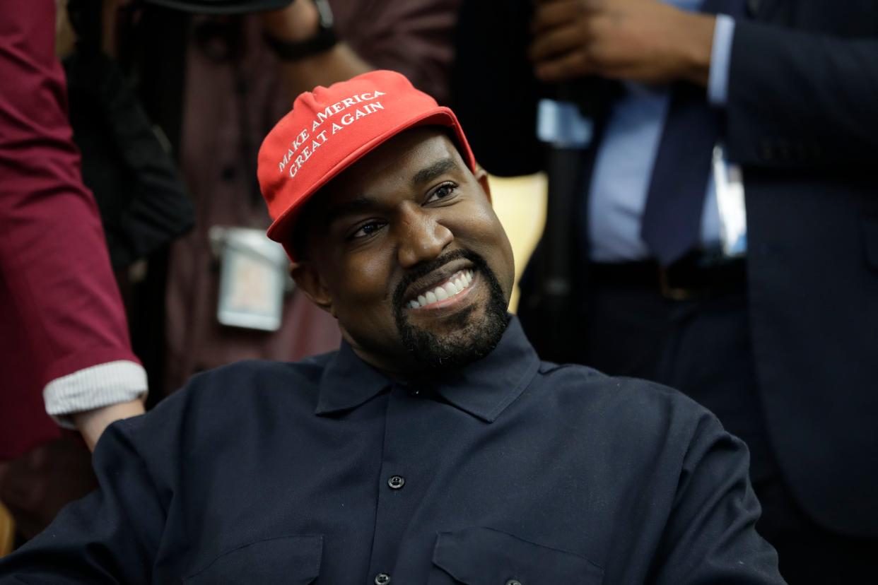 Rapper Kanye West wears a Make America Great Again hat during a meeting with President Donald Trump in the Oval Office of the White House in Washington, D.C. on Oct. 11, 2018. 