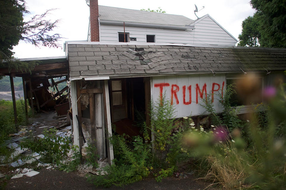 An abandoned house is spray painted "Trump!" on August 14, 2016 in Schuylkill County, Pennsylvania. This Northeastern Pennsylvania region has a rich coal mining history, but the majority of nearby coal mines have closed.<span class="copyright">Photo by Mark Makela/Getty Images</span>
