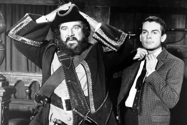 <p>Everett Collection</p> Peter Ustinov and Dean Jones in ‘Blackbeard’s Ghost’