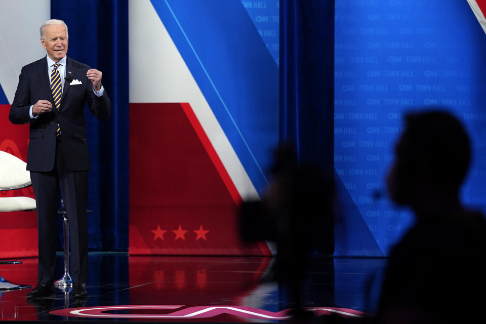 President Joe Biden answers questions during a televised town hall event at Pabst Theater, Tuesday, Feb. 16, 2021, in Milwaukee. (AP Photo/Evan Vucci)