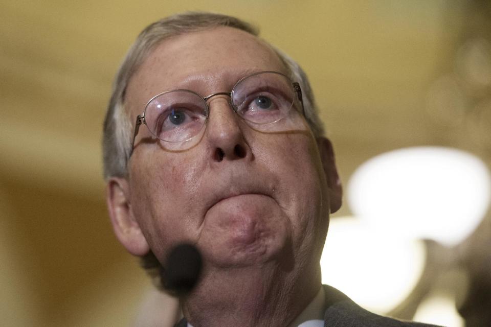 In this Jan. 4, 2017 file photo, Senate Majority Leader Mitch McConnell of Ky. pauses during a news conference on Capitol Hill in Washington. AP Photo/Cliff Owen, File