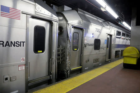 FILE POTO: A New Jersey Transit train is pictured at Pennsylvania Station as it shows some damage after being involved in an incident in the Manhattan borough of New York, U.S., March 24, 2017. REUTERS/Lucas Jackson/File Photo