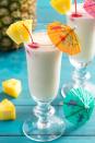 <p>Is it even a piña colada without an umbrella in it?</p><p>Get the recipe from <a href="https://www.delish.com/cooking/recipe-ideas/recipes/a4262/pina-colada-drinks-cocktails/" rel="nofollow noopener" target="_blank" data-ylk="slk:Delish;elm:context_link;itc:0;sec:content-canvas" class="link ">Delish</a>.<br></p>