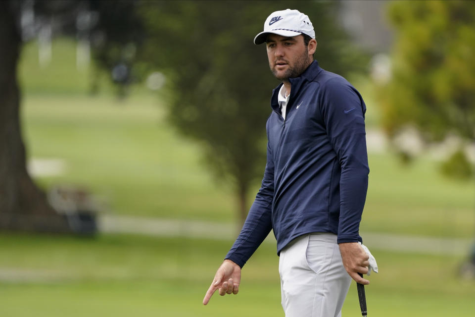 Scottie Scheffler reacts after missing a putt on the sixth hole during the first round of the PGA Championship golf tournament at TPC Harding Park Thursday, Aug. 6, 2020, in San Francisco. (AP Photo/Charlie Riedel)