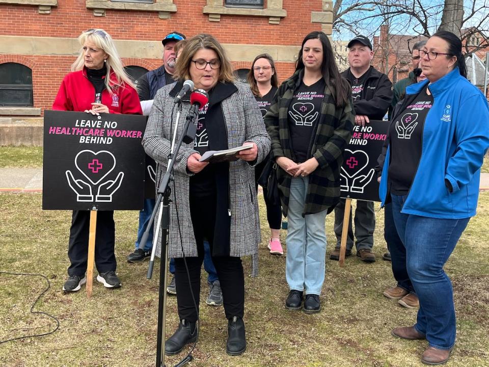 CUPE national servicing representative Lori MacKay speaks to the media outside the P.E.I. Legislature on Thursday.