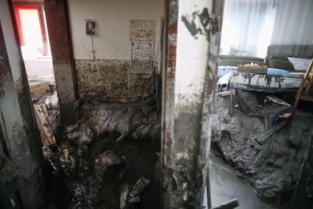 Mud covers the entrances of the bedroom and kitchen in the Kovacevic's family home after severe floods in Topcic Polje May 31, 2014. REUTERS/Dado Ruvic