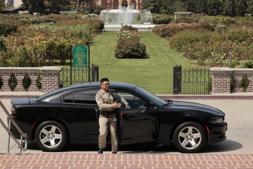 Exposition Park police Capt. Mariano Santiago Jr. patrols in Exposition Park