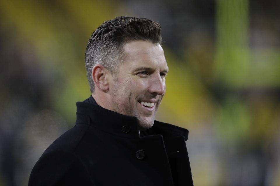 FILE - San Francisco 49ers assistant general manager Adam Peters watches warm ups before an NFC divisional playoff NFL football game against the Green Bay Packers Saturday, Jan. 22, 2022, in Green Bay, Wis. The Washington Commanders have an agreement in place to hire San Francisco 49ers assistant general manager Adam Peters as their new head of football operations, according to a person with knowledge of the move. The person spoke to The Associated Press on condition of anonymity Friday, Jan. 12, 2024, because the team had not yet announced the hire. (AP Photo/Aaron Gash, File)