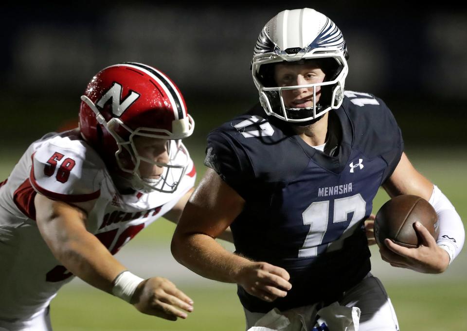 Menasha's Logan Liegl (17) has helped lead the Bluejays to the second round of the WIAA playoffs. Menasha travels to New Berlin West for a Division 3 game Friday.