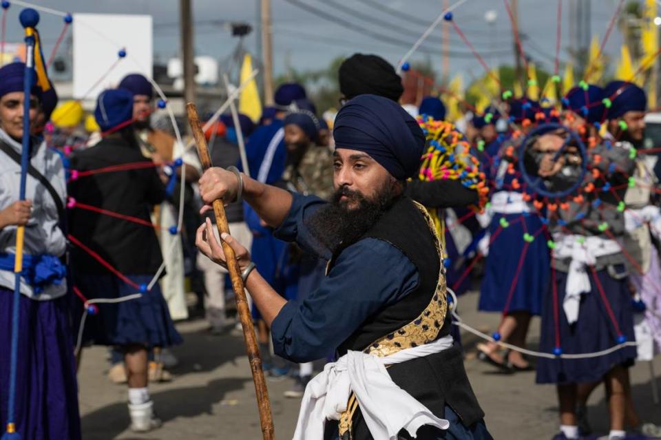 Members of the California Gatka Dal perform martial arts of Punjab during the Yuba City Nagar Kirtan Sikh parade on Nov. 5.